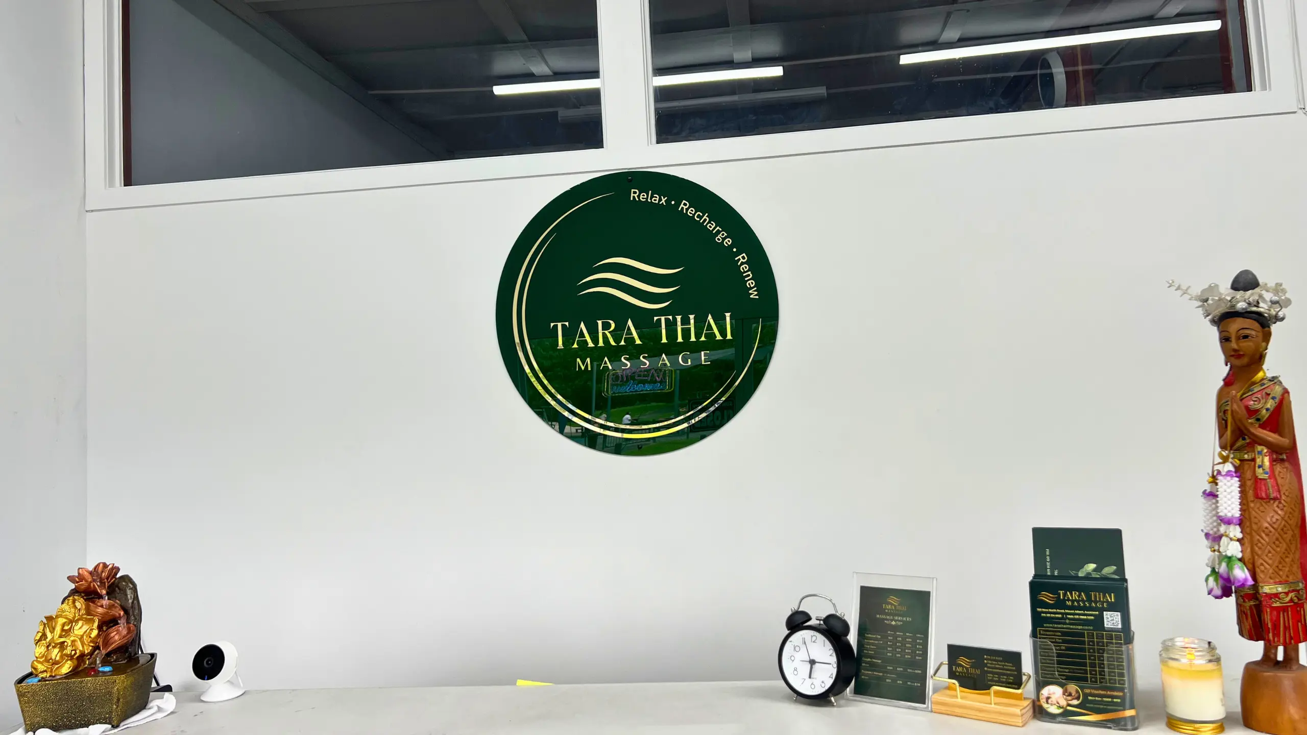 Reception area at Tara Thai Massage in Mount Albert, Auckland, showing the business logo and front desk in a calm, welcoming environment.